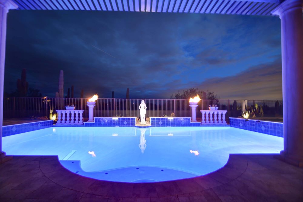 Backyard swimming pool and decking built by Saturn Pool Company in Arizona